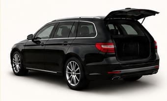 Black estate car with luggage space for station pickups