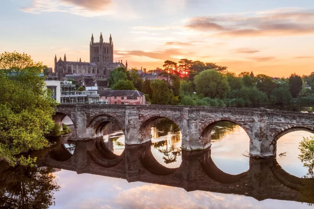 Hereford Cathedral and bridge at sunset for Hereford Taxis contact page